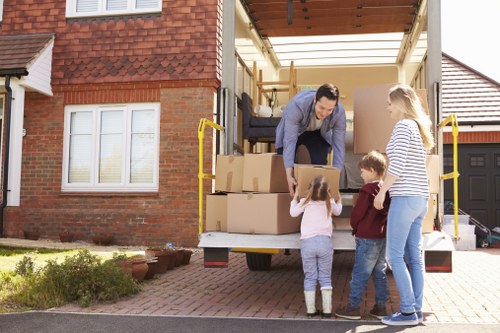 Removal van and movers handling a local home move in Anerley