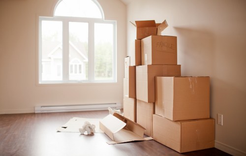 Prepared boxes and furniture organised for a house move in Anerley