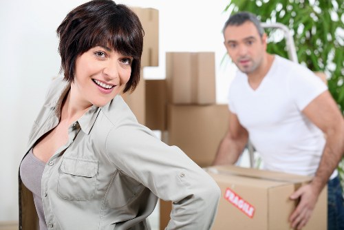 Furniture dismantling and careful loading during an office move